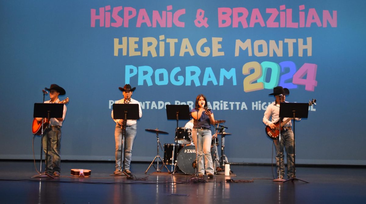 The student band, Grupo Desconocido, performs for the seniors as they enter the MPAC to kick off the HBHM celebration. The program was available live stream for everyone else via Blue Devil News.