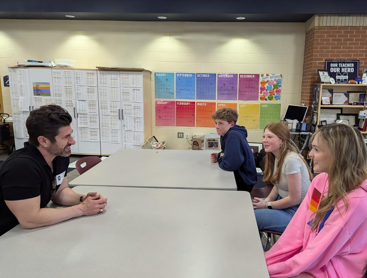 Marino visits Marietta High School to talk about his community involvement.